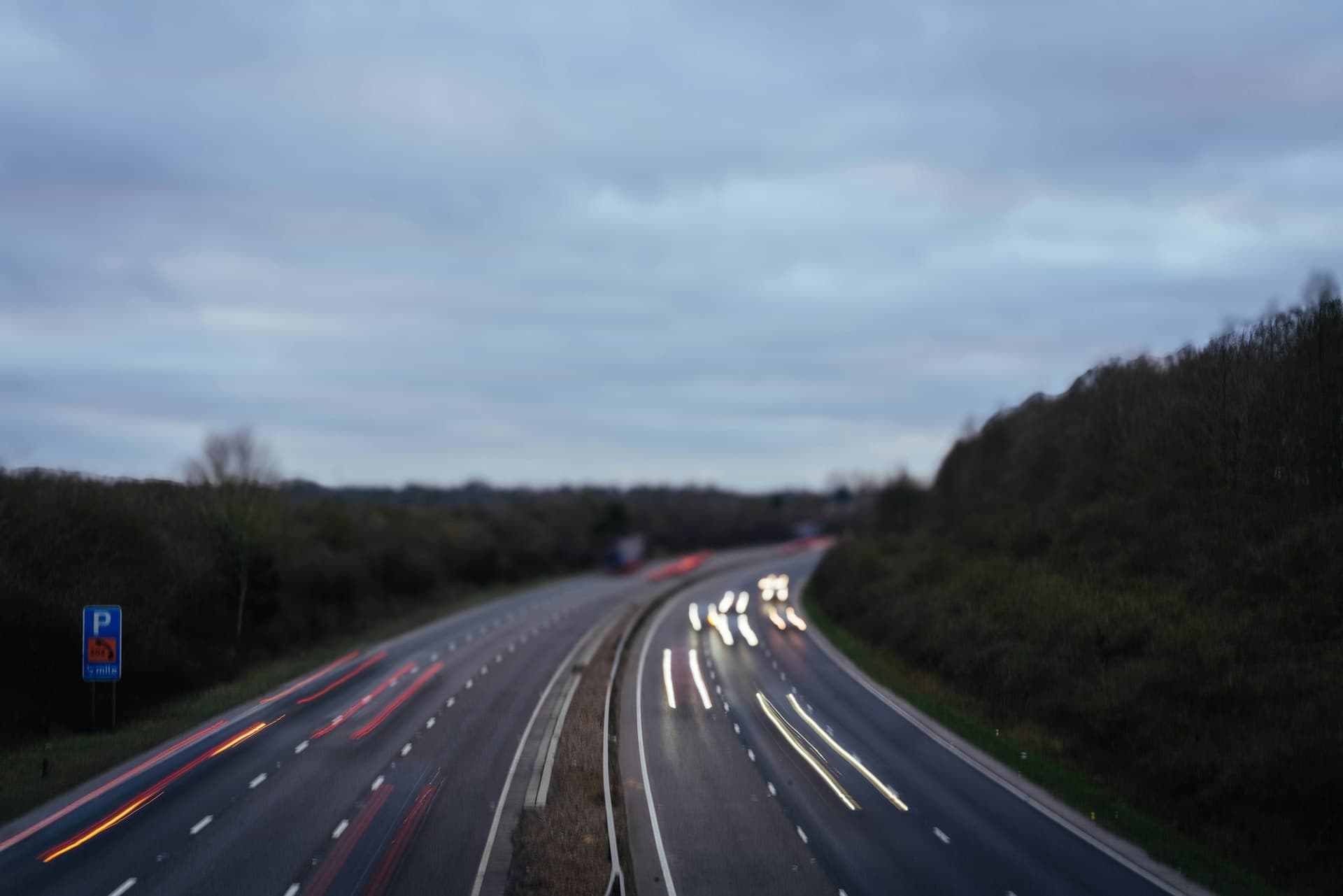 Light trails from traffic on a motorway at dusk